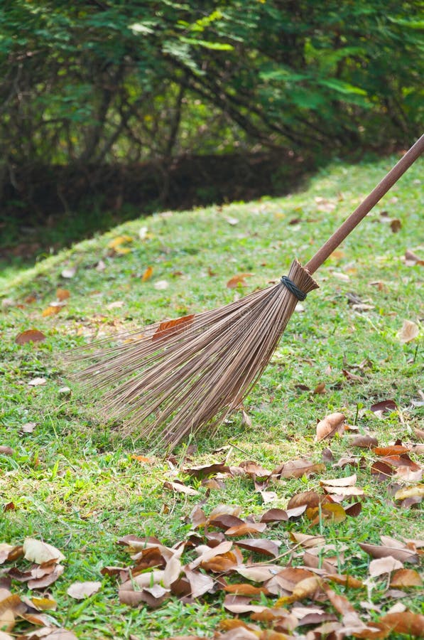 Leaf broom in the garden stock image. Image of field 38726783