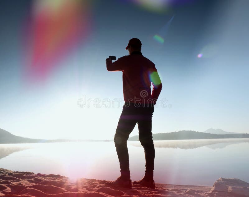 Blue Light on Man Standing by Lake · Free Stock Photo