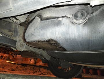 Leaking Oil Under the Engine Stock Image - Image of leaking, bumper