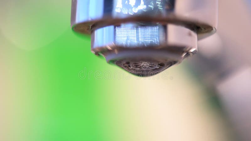 Leaky tap dripping water drops .