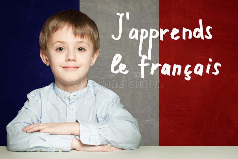 Learn french language concept. Happy child student and tittle