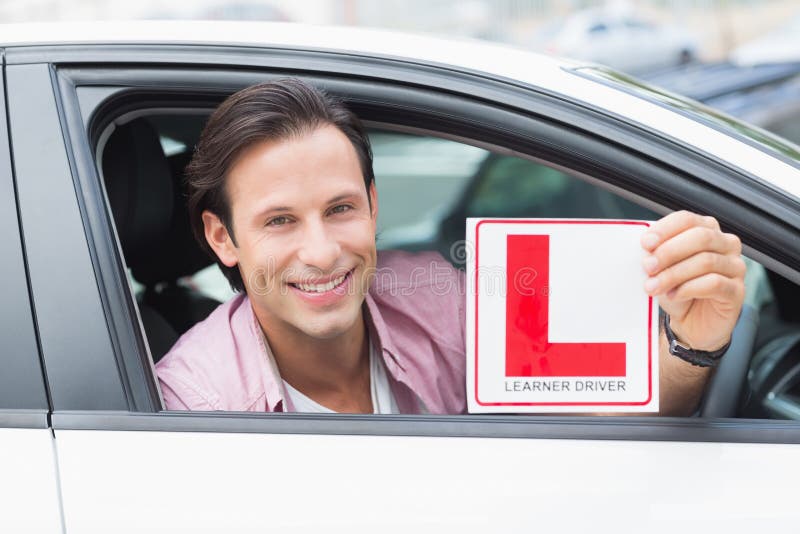 Learner Driver Smiling and Holding L Plate Stock Image Image of