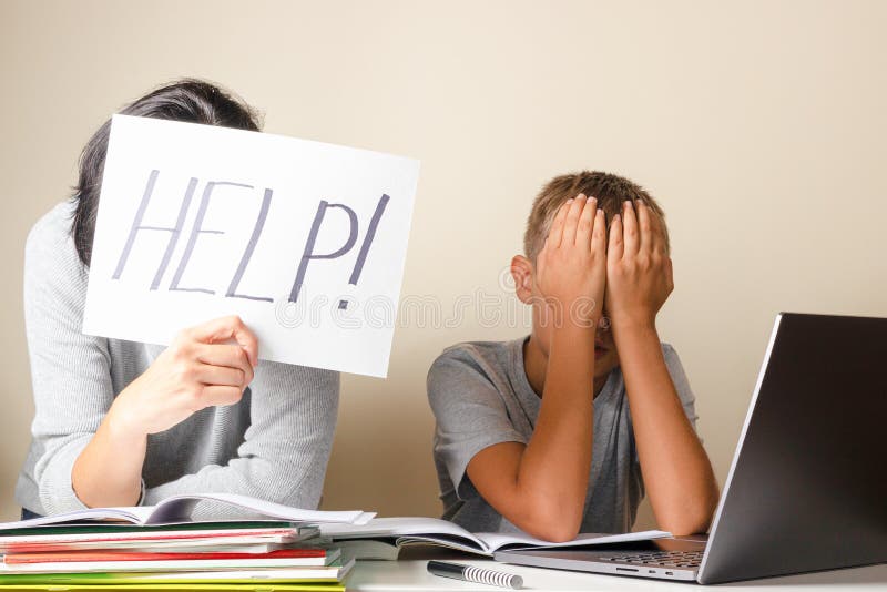 Learning difficulties, remote education, online learning and working at home. Tired mother and sad kid need help to do royalty free stock photos
