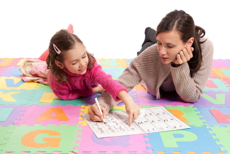 Learning handwriting practice with teacher stock photo Learning handwriting practice with teacher stock photo