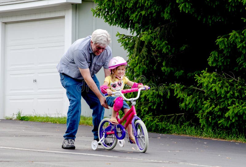 276 Learning To Ride Bike Training Wheels Stock Photos Free & Royalty