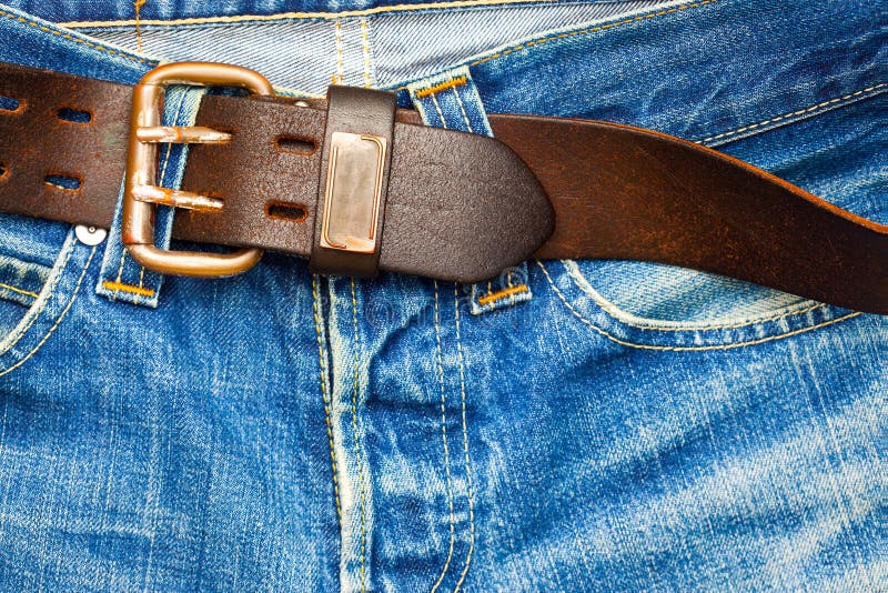 Leather belt on old jeans stock photo. Image of button - 92244916