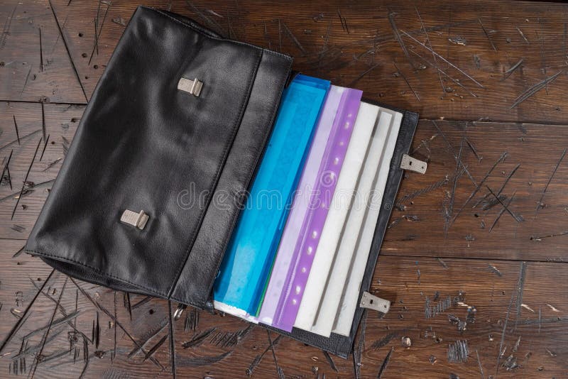 Leather Briefcase with Documents. Lots of Documents in the Portfolio