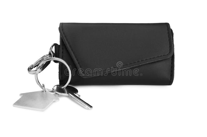 Leather case with key on white. Leather case with key on white