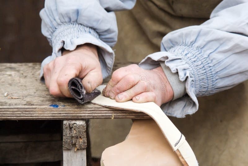 Leather Craftsmen Working Making in Patterns at Table in