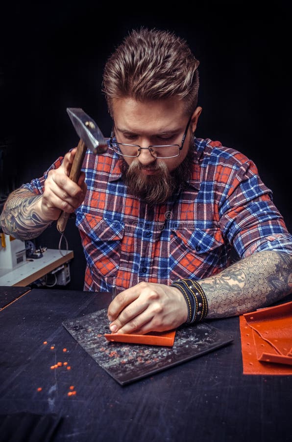 Craftsman Working with Leather Working As Artisan Stock Photo Image