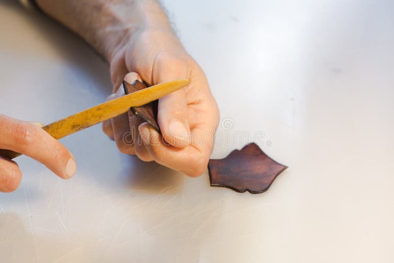 Leather Edge Burnishing, Leather Edge Finishing by Handmade Tools. the  Process of Manufacturing a Leather Wallet Stock Image - Image of equipment,  master: 182682163