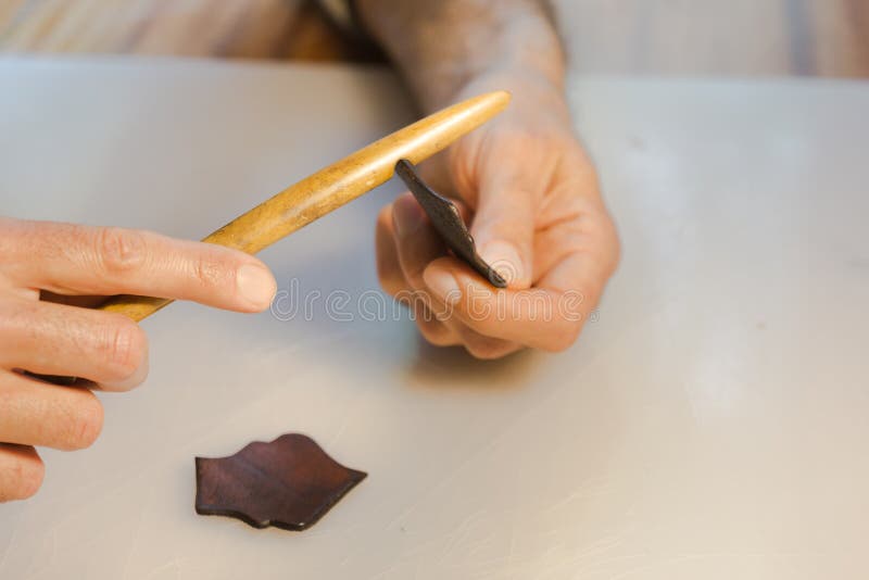 Leather Edge Burnishing, Leather Edge Finishing by Handmade Tools. the  Process of Manufacturing a Leather Wallet Stock Image - Image of equipment,  master: 182682163