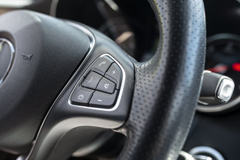 Leather Multifunction Steering Wheel in a Luxury Car, Visible Call and