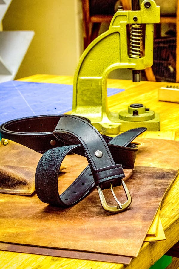 Leather Belt in Front of Grips on Table Stock Image Image of