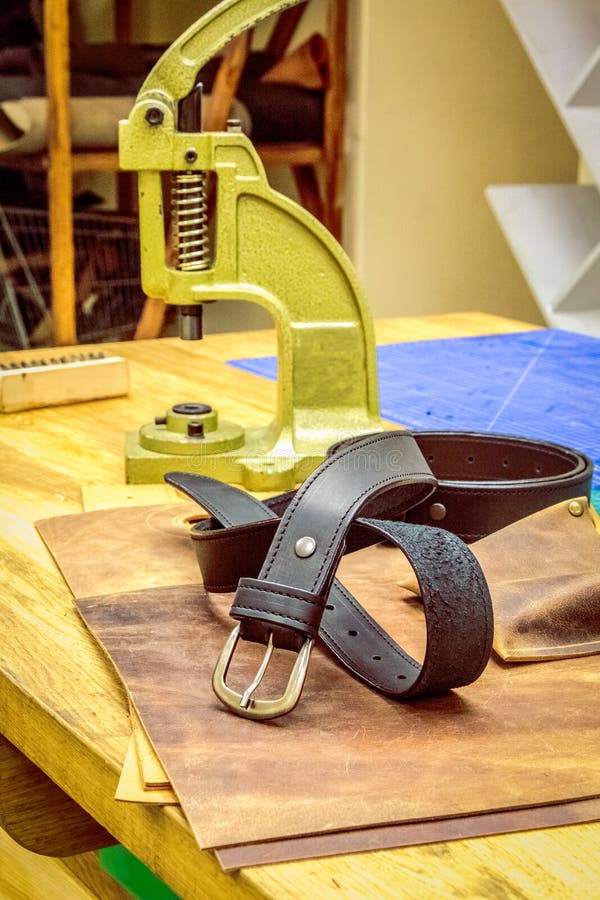 Leather Belt in Front of Grips on Table Stock Image Image of