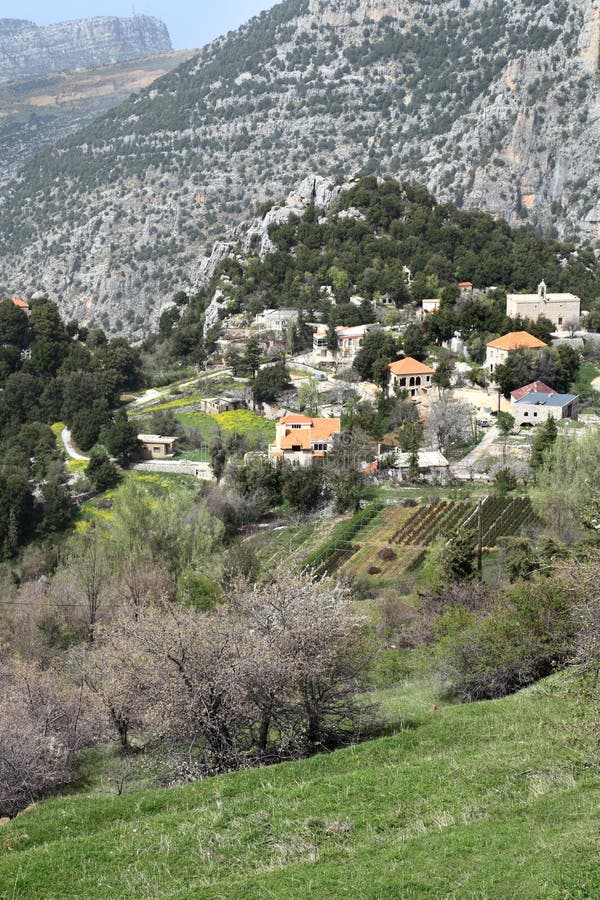 Lebanon mountain village with traditional red roofed houses.