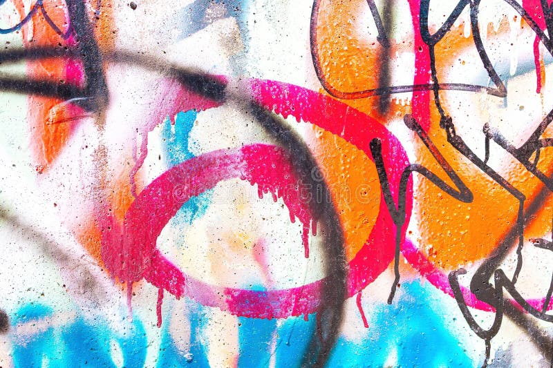 Lebhafte Abstract Graffiti Art mit Neon Pink Orange Blue on Urban Wall lizenzfreie stockbilder
