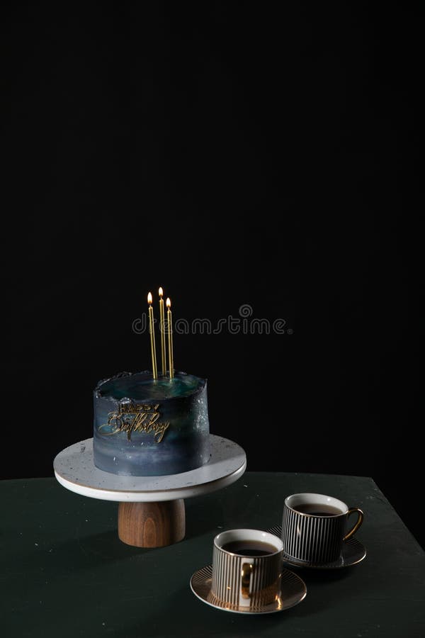 a birthday cake with three candles two cups coffee dessert sweets delicious food. a birthday cake with three candles two cups coffee dessert sweets delicious food