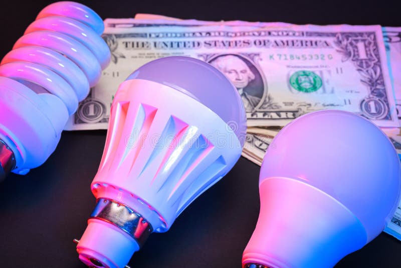 A LED Bulb with Dollars Banknotes Stock Photo Image of light, bill