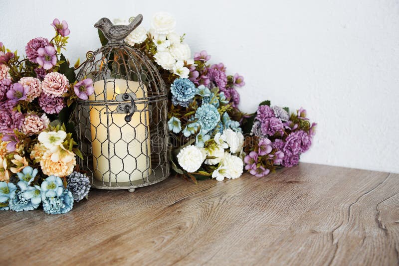 LED Candle Light with Flower Decorated on Wooden Background Stock Image