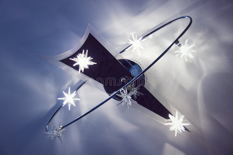 LED Ceiling Light in a Room with Burning Lights. Stock Photo Image of