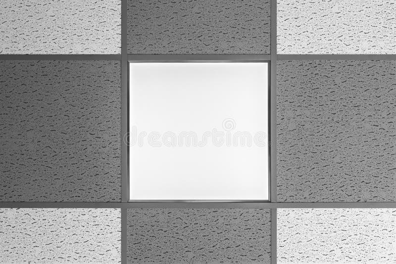 LEDDE panelen för taklampan integreras den typ in i det inställda taket med ljudtäta paneler, typ av kontorsbelysning, inre abs royaltyfri bild LEDDE panelen för taklampan integreras den typ in i det inställda taket med ljudtäta paneler, typ av kontorsbelysning, inre abs royaltyfri bild