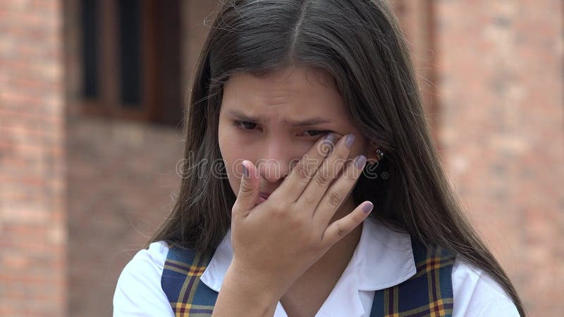 Ledsen tårfylld kvinnlig student royaltyfri bild Ledsen tårfylld kvinnlig student royaltyfri bild