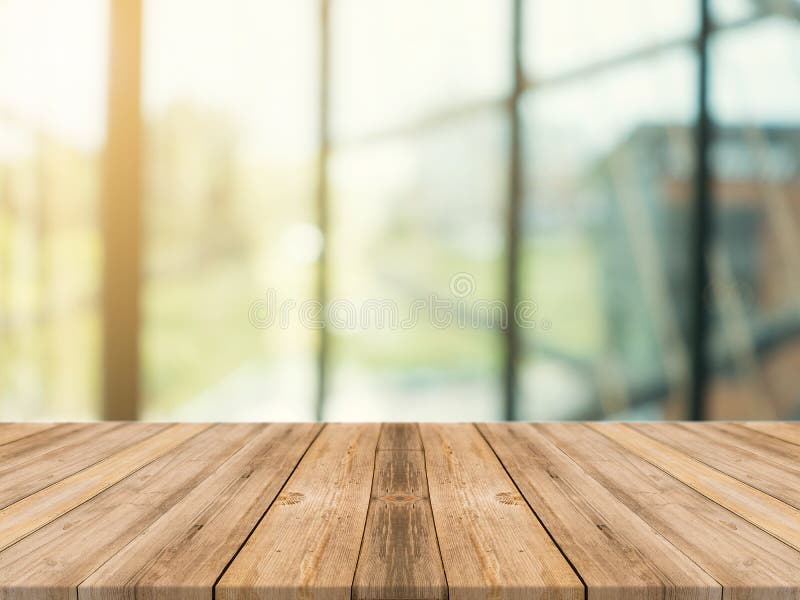 Leere Tischplatte des hölzernen Brettes an unscharfer Hintergrund Braune hölzerne Tabelle der Perspektive über Unschärfe im Kaffe