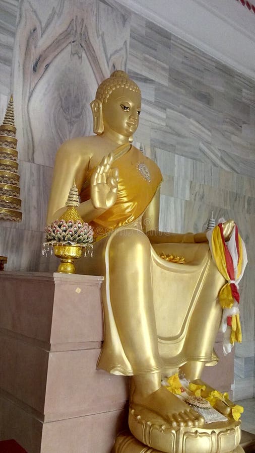 Left side view of lord Buddha statue stock images