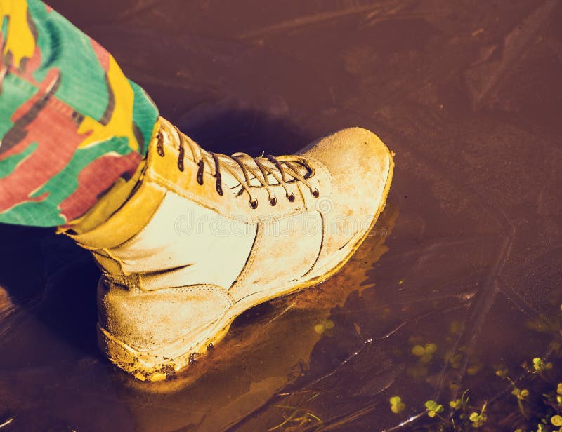 Leg in Combat Boots Comes on the Thin Ice Stock Photo Image of steps