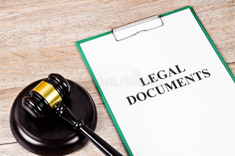 Legal document paper file with gavel stock images Legal document paper file with gavel stock images