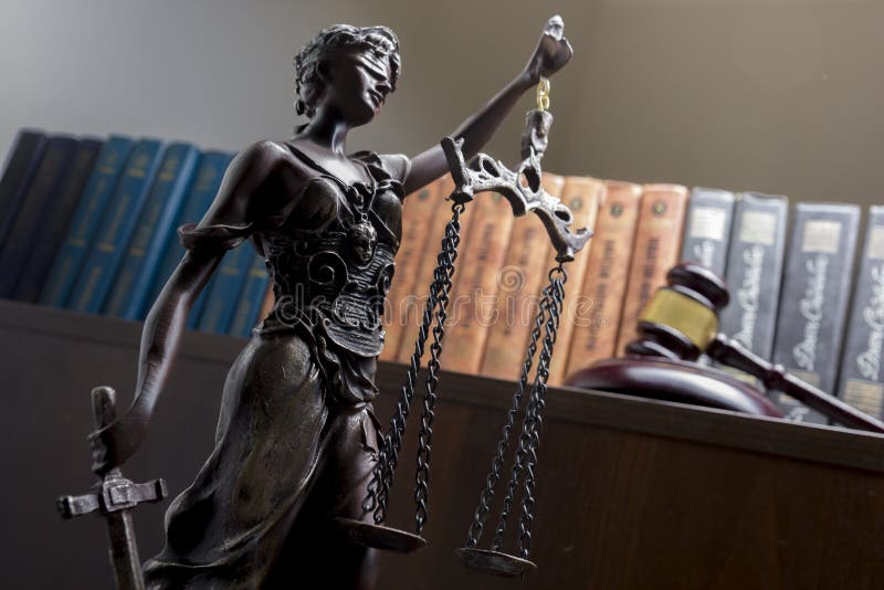 Legal Law concept - Open law book with a wooden judges gavel on table in a courtroom or law enforcement office. Copy stock photography Legal Law concept - Open law book with a wooden judges gavel on table in a courtroom or law enforcement office. Copy stock photography