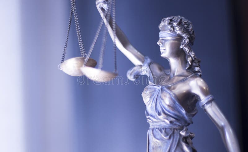 Legal blind justice Themis metal statue with scales in chain in law firm offices photo. Legal blind justice Themis metal statue with scales in chain in law firm offices photo.