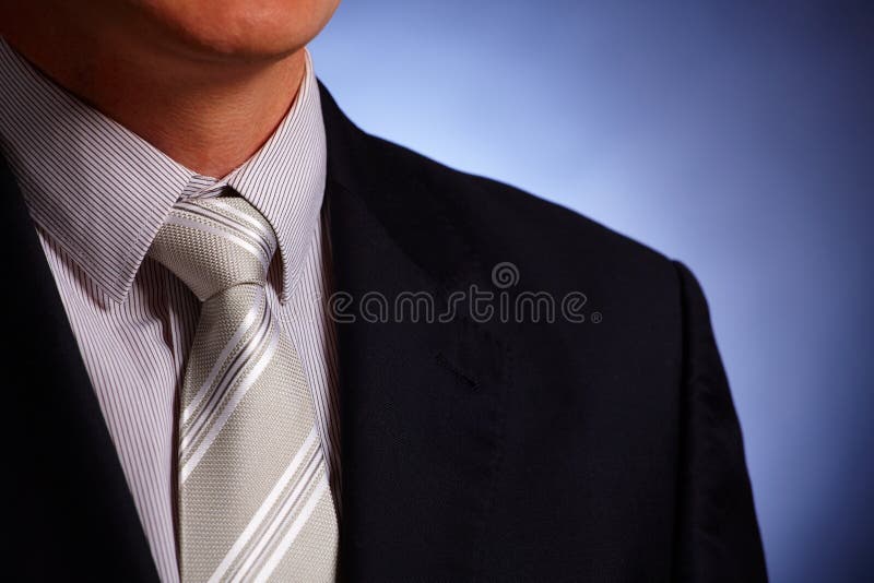 Legame dell'uomo d'affari e primo piano del vestito fotografia stock Legame dell'uomo d'affari e primo piano del vestito fotografia stock