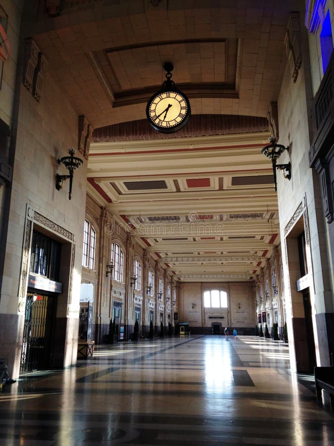 A couple strolls down the huge empty hall of Union Station in Kansas City, Missouri. A couple strolls down the huge empty hall of Union Station in Kansas City, Missouri.