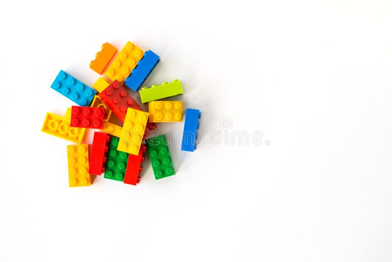 Lego backround. A bunch of Multicolor Plastick constructor bricks on white background. Popular toys. Copyspace. Lego backround. A bunch of Multicolor Plastick constructor bricks on white background. Popular toys. Copyspace