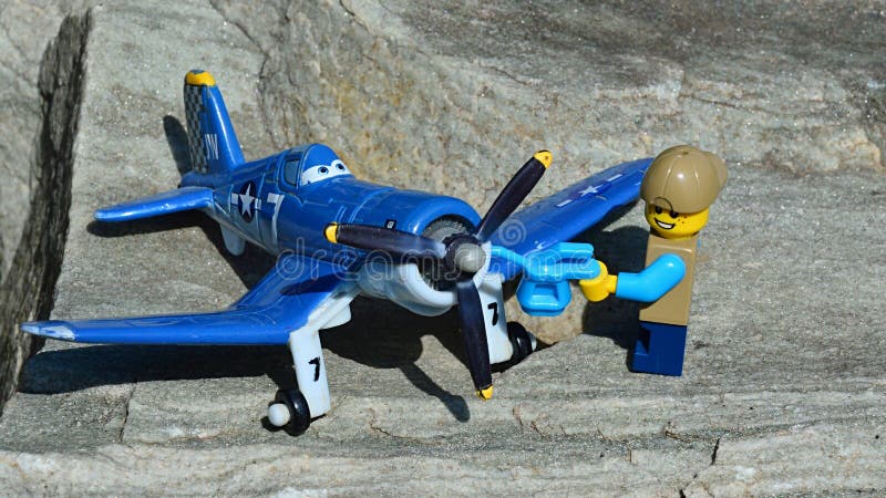 LEGO City Figure of Gloomy Prisoner is Tightening Propeller of Vought F4U Corsair Aircraft Model Named Editorial Photo - Image of ground, airplane: 246020706
