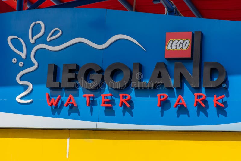 `Dubai, Dubai/United Arab Emirates - 11/16/2019: Legoland Dubai Water Park Theme Park Resort for children entrance sign with a blue background. Luxury travel resort destination