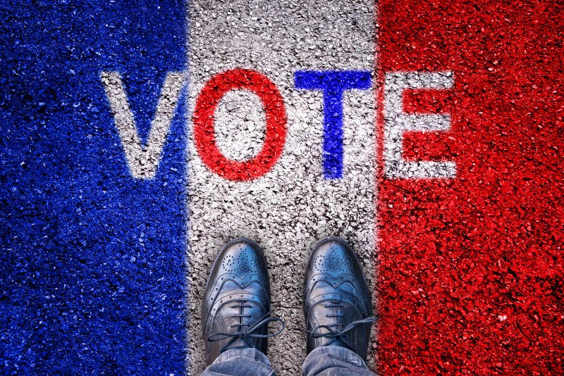 Legs on asphalt with french flag and the word `vote`. Legs and shoes on asphalt with french flag and the word `vote stock photo Legs on asphalt with french flag and the word `vote`. Legs and shoes on asphalt with french flag and the word `vote stock photo