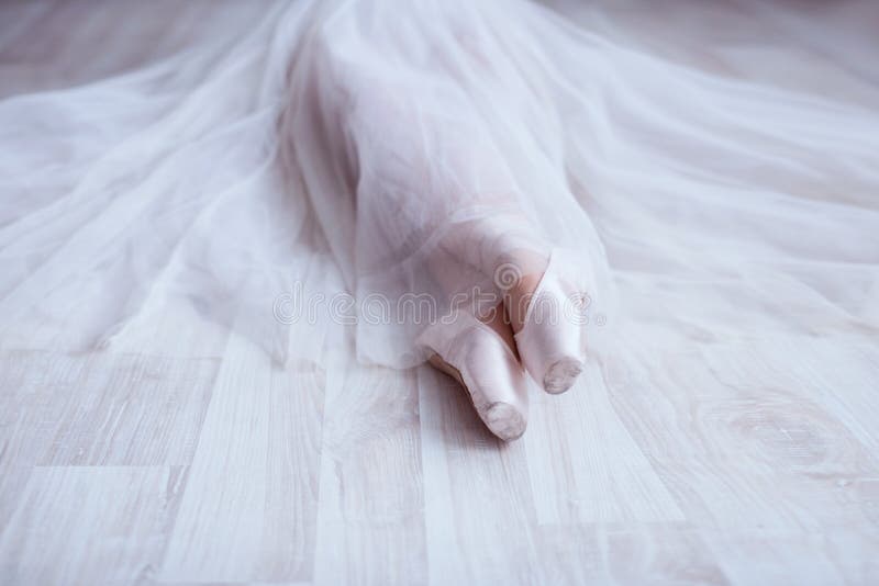 Legs of a ballerina in pointe shoes, lifestyle, hobbies, dancing, choice