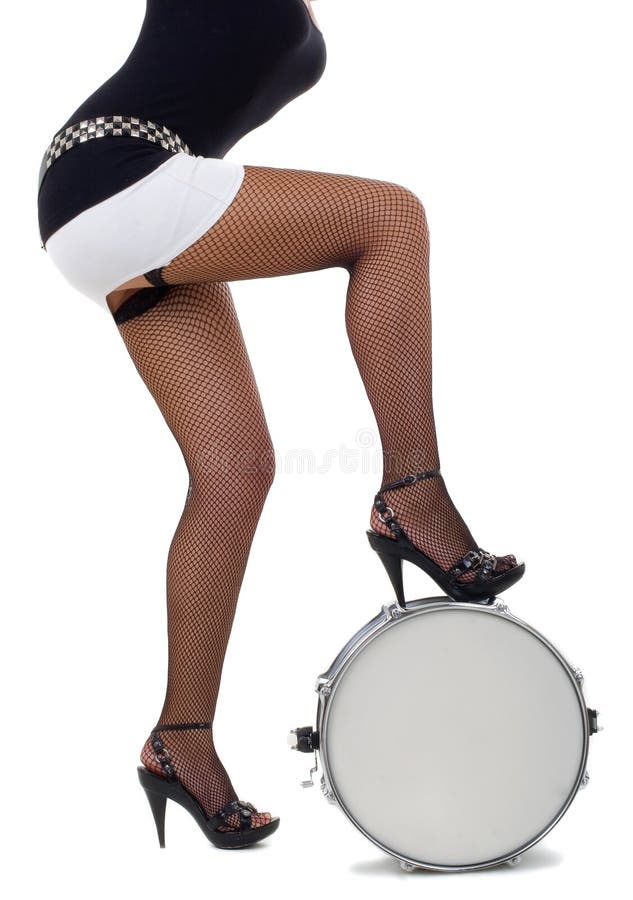 Legs of beautiful brunette and snare drum