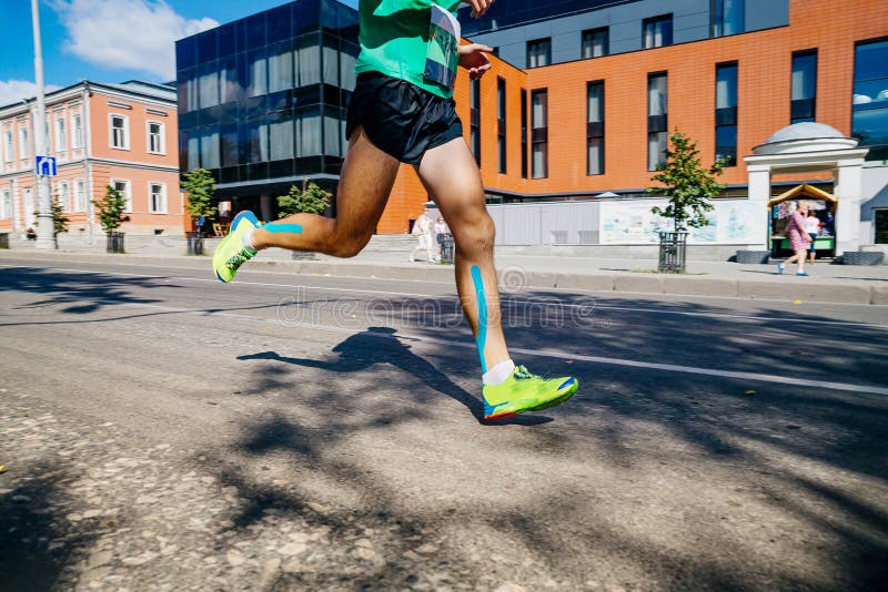 Legs Runner Athlete with Kinesio Tape Run Stock Photo - Image of calf ...