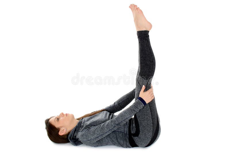 Woman doing yoga Legs Up or Viparita Karani variation yoga pose, Stock  image