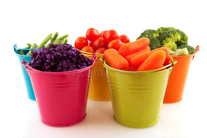 Little metal buckets with fresh vegetables on white background. Little metal buckets with fresh vegetables on white background