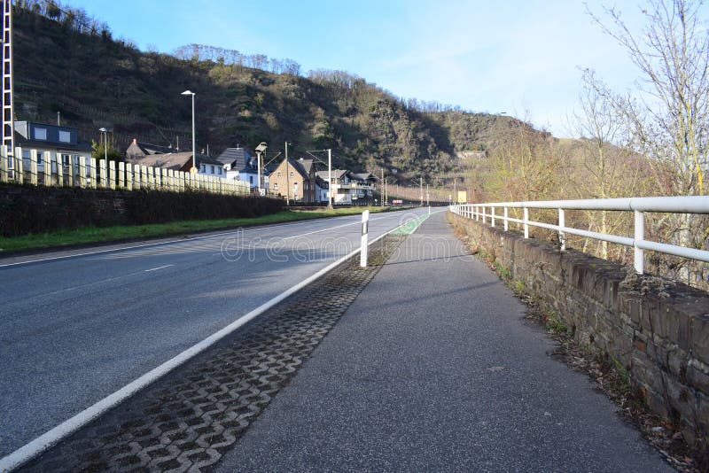 Mosel valley road near Lehmen during the winter flood 2023. The small flood only covered the lower roads, parks and ways at the water. The January flood was lower than the years before. Mosel valley road near Lehmen during the winter flood 2023. The small flood only covered the lower roads, parks and ways at the water. The January flood was lower than the years before.