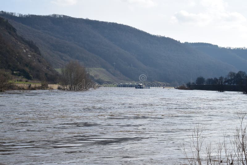 Mosel valley road near Lehmen during the winter flood 2023. The small flood only covered the lower roads, parks and ways at the water. The January flood was lower than the years before. Mosel valley road near Lehmen during the winter flood 2023. The small flood only covered the lower roads, parks and ways at the water. The January flood was lower than the years before.