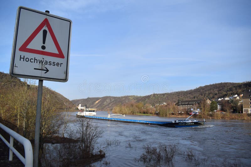 Mosel valley road near Lehmen during the winter flood 2023. The small flood only covered the lower roads, parks and ways at the water. The January flood was lower than the years before. Mosel valley road near Lehmen during the winter flood 2023. The small flood only covered the lower roads, parks and ways at the water. The January flood was lower than the years before.