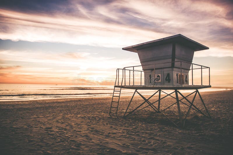 Lifeguard Tower on the California Beach, United States. Sunset in California. Lifeguard Tower on the California Beach, United States. Sunset in California.