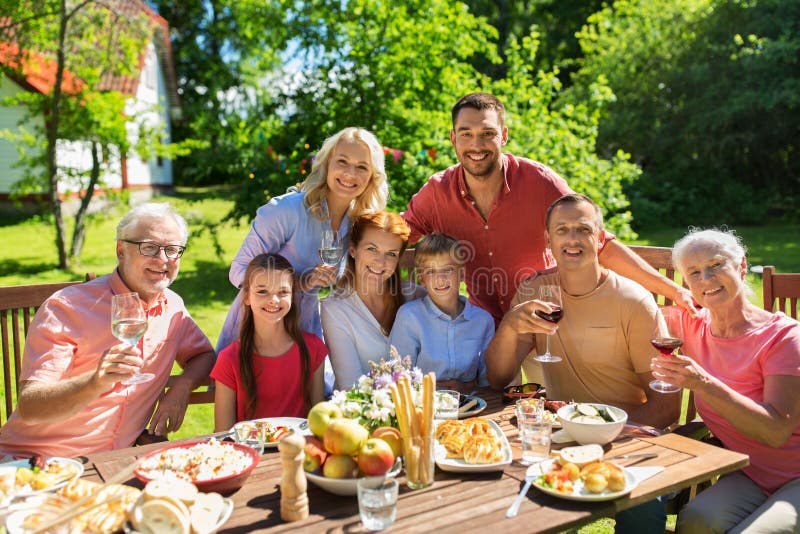 Happy Family Having Dinner Or Summer Garden Party Stock Image - Image