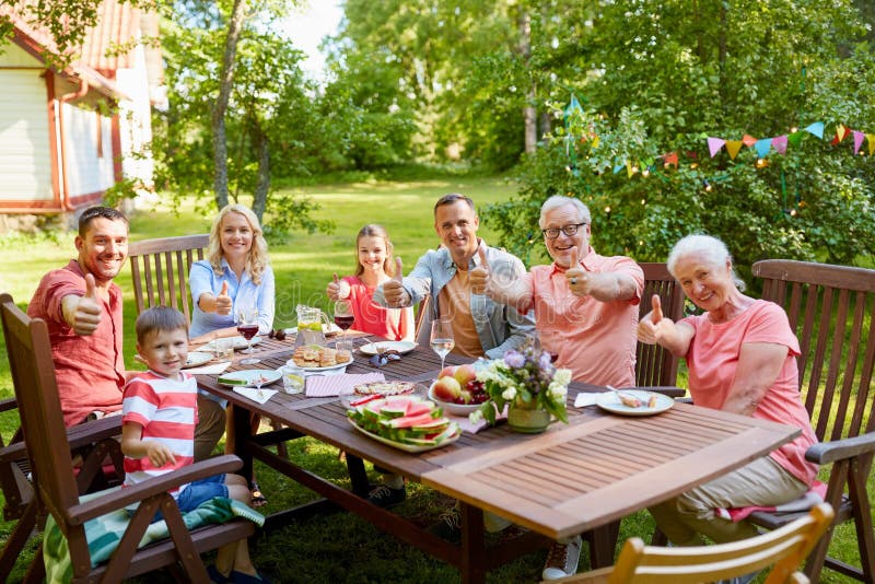 Happy Family Having Dinner or Summer Garden Party Stock Photo - Image